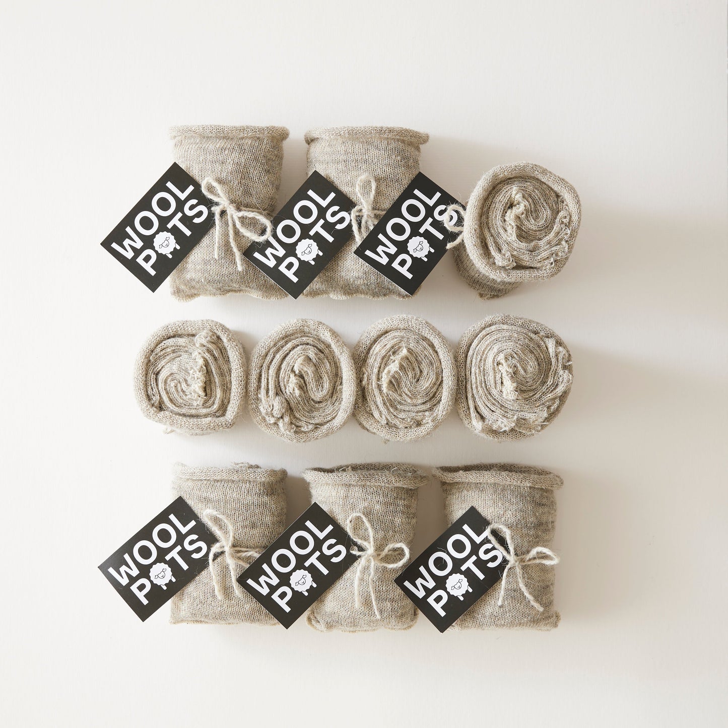 Pack of 100 biodegradable wool plant pots for gardeners and growers